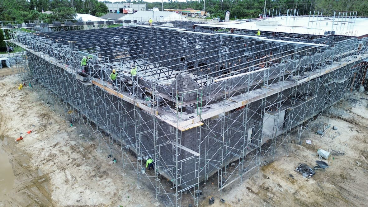 A building being built with scaffolding around it.